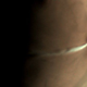 An over 900-mile-long-cloud spilling from the top of Arsia Mons on the surface of Mars.